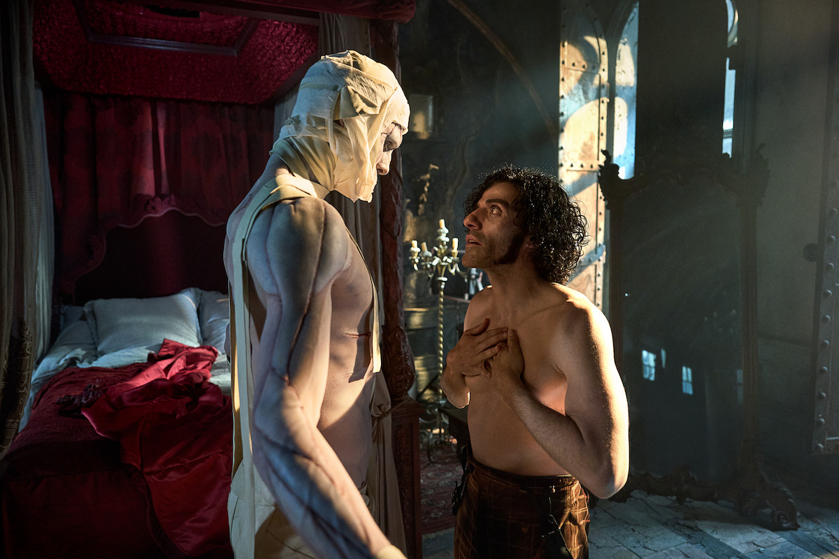 Jacob Elordi and Oscar Isaac in character on the set of Frankenstein