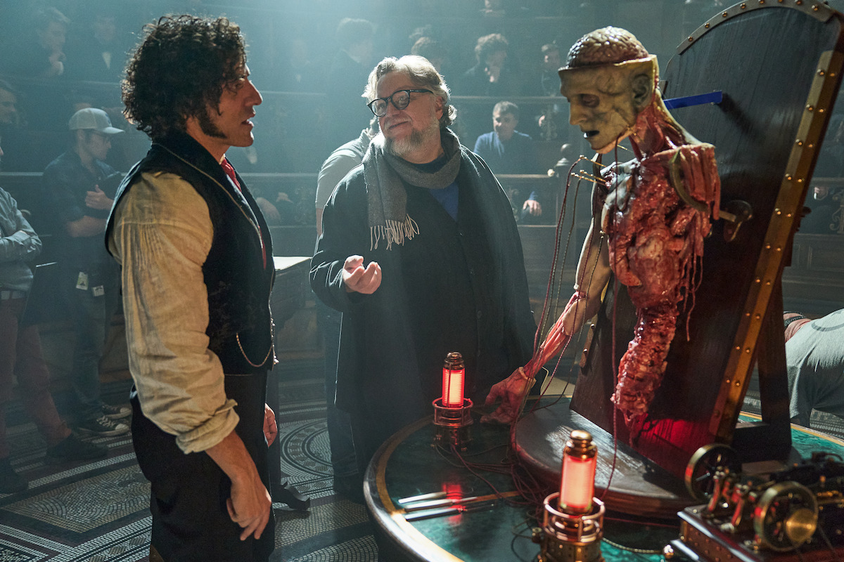 Oscar Isaac and Guillermo del Toro on the set of Frankenstein