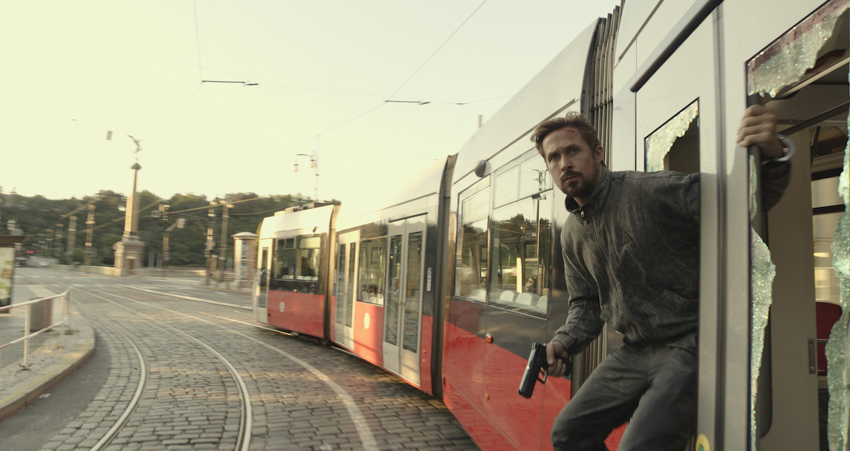 Ryan Gosling and Chris Evans Play Spy Games in new ‘The Gray Man’ Photos
