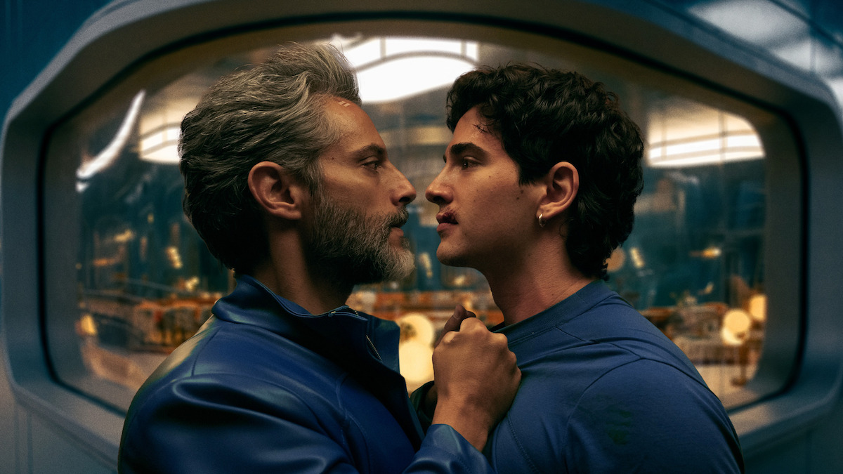  Joaquín Furriel as Guillermo threatens Pau Simon as Max in a production still from 'Billionaires' Bunker.'