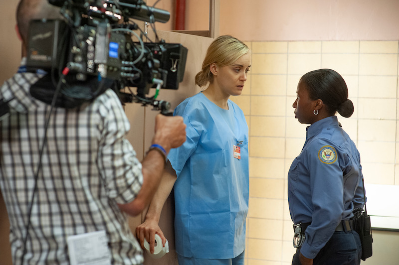 (L to R) Ludovic Littee (Director of Photography), Taylor Schilling as Piper on the set of Orange Is The New Black Season 3.