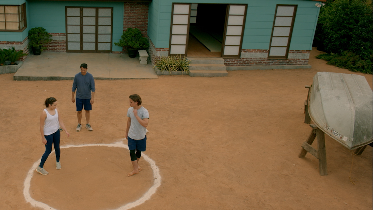 An image of Daniel's dojo and the yard where he trains his daughter Sam and her friend Robby Keene