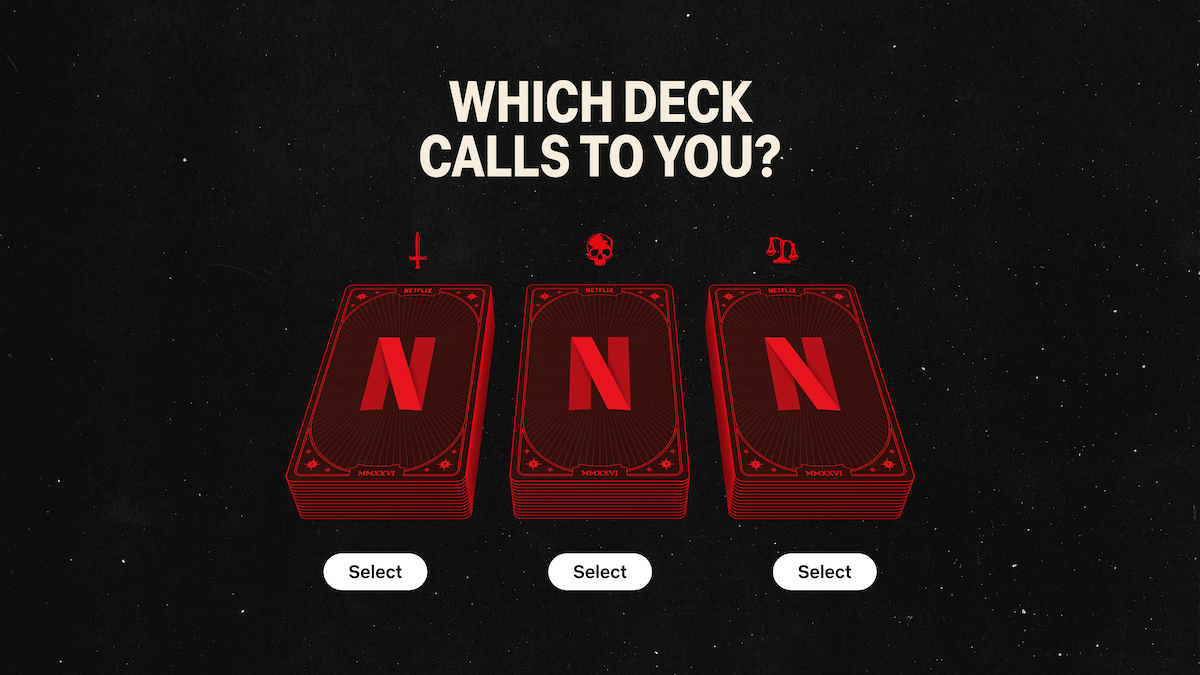 Three red playing cards with Netflix logos on a starry black background, each card labeled with a symbol (sword, skull, music note) and a "Select" button below. Text above asks, "Which deck calls to you?"