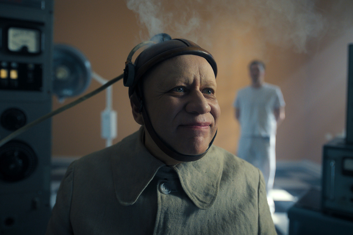 Fred Armisen as Uncle Fester undergoing electroshock therapy in ‘Wednesday’ Season 2.