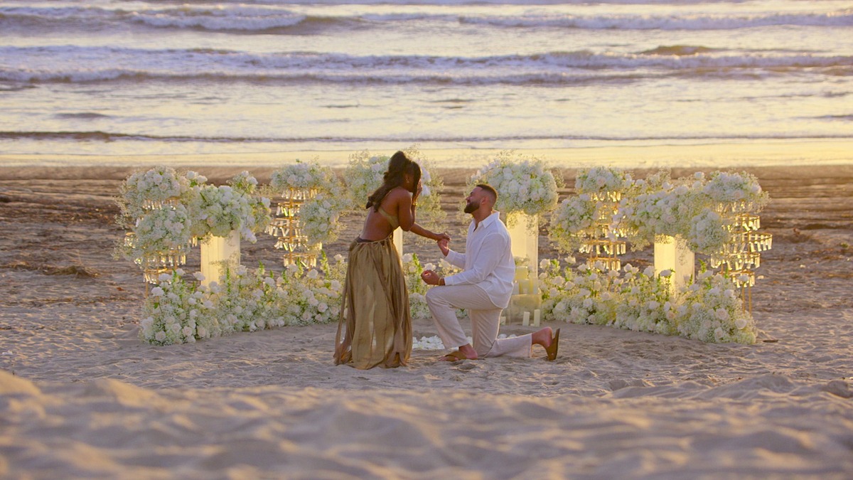 AD and Ollie on beach.