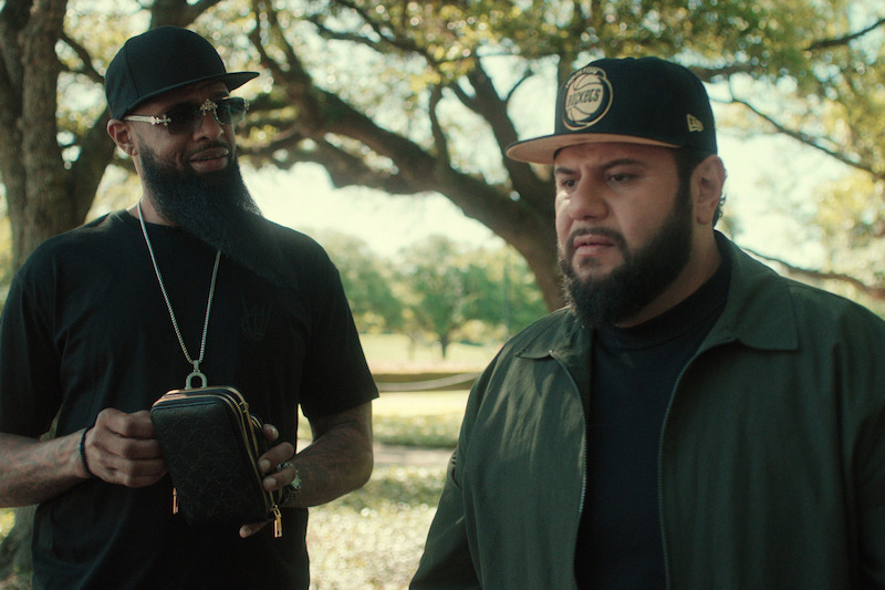 Stayve ‘Slim Thug’ Thomas as Slim Thug, Mo Amer as Mo in 'Mo' Season 2.