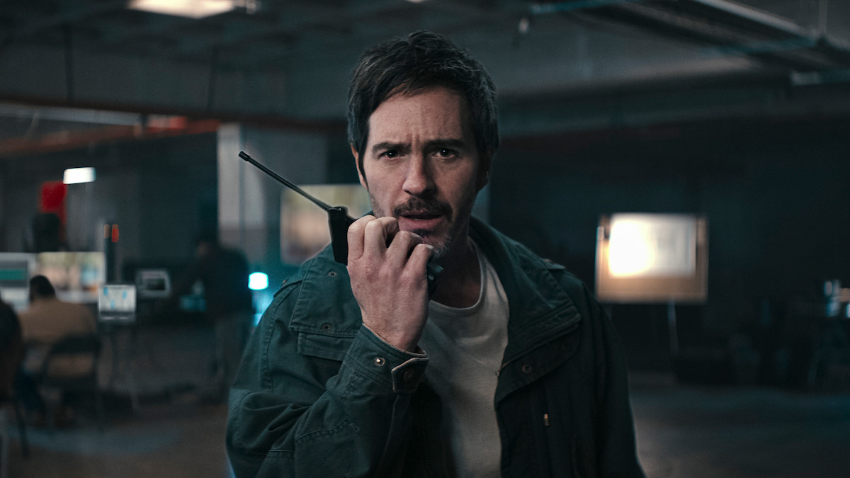 Mauricio Ochmann as Alan Bender speaks into a phone in ‘Non Negotiable.’