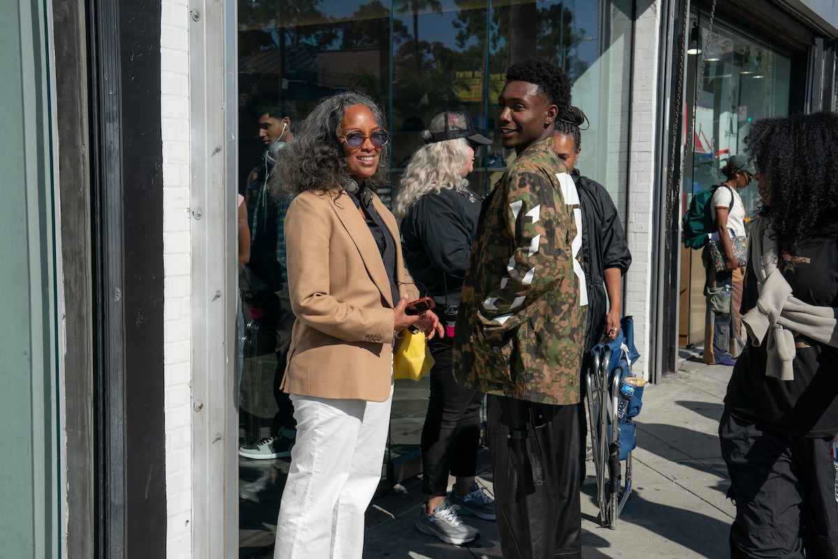 Showrunner/Executive Producer Mara Brock Akil and Niles Fitch as Darius behind the scenes of ‘Forever’