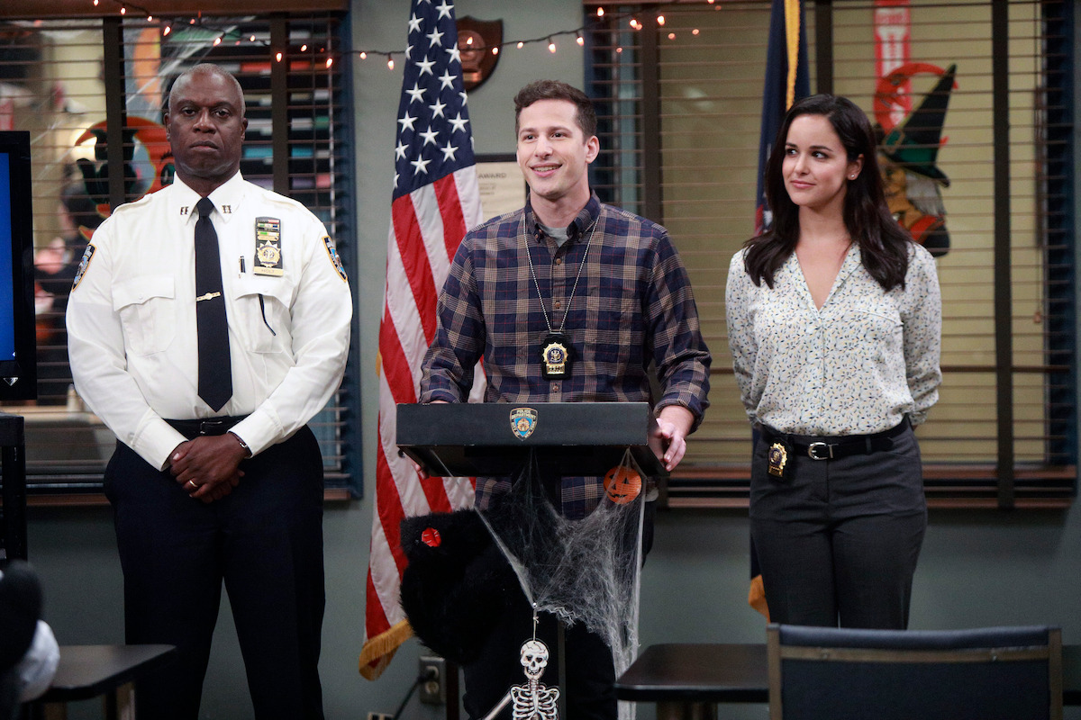 BROOKLYN NINE-NINE -- "HalloVeen" Episode 504 -- Pictured: (l-r) Andre Braugher as Ray Holt, Andy Samberg as Jake Peralta, Melissa Fumero as Amy Santiago -- (Photo by: Jordin Althaus/Fox/Universal Television)