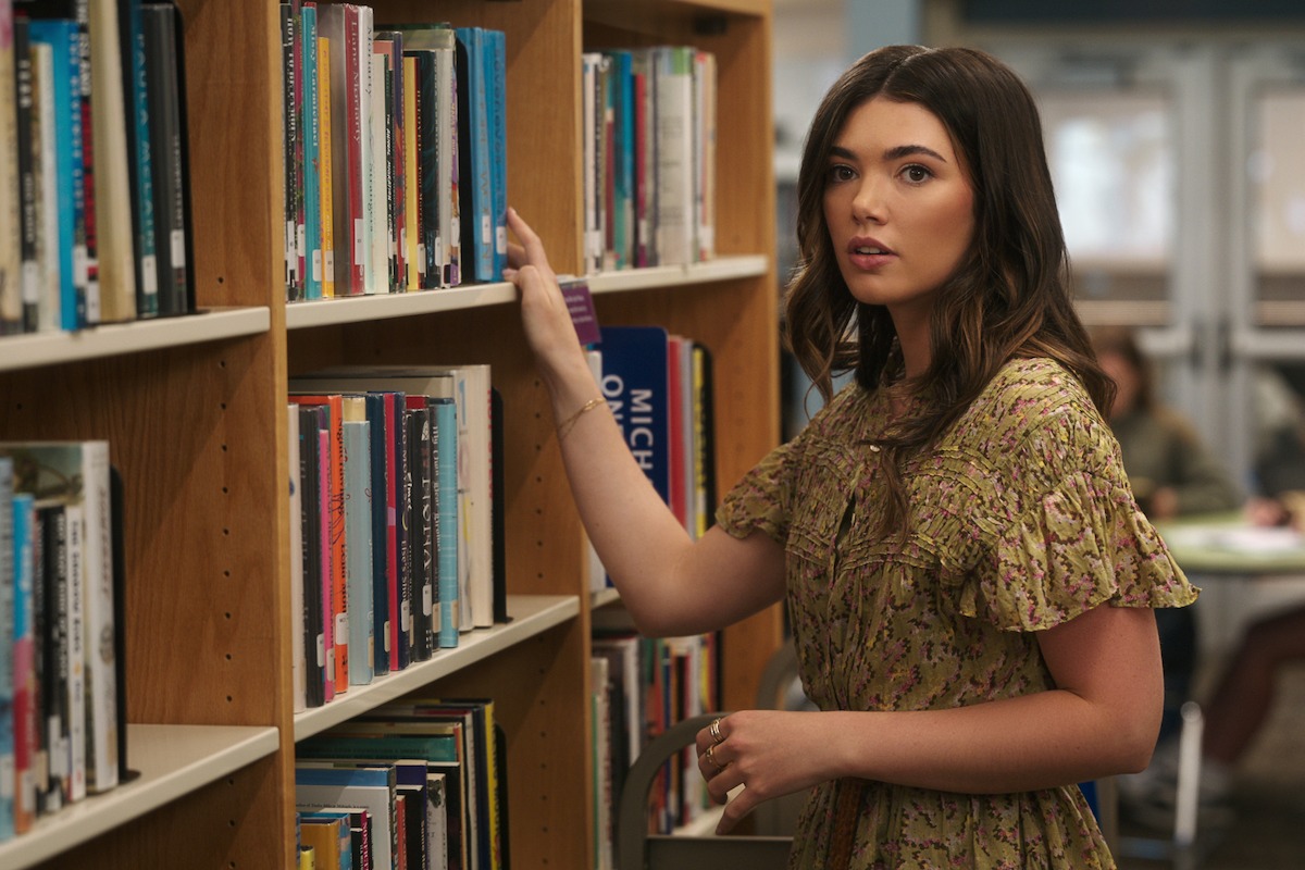 Alisha Newton as Erin in a library in ‘My Life with the Walter Boys’ Season 2.