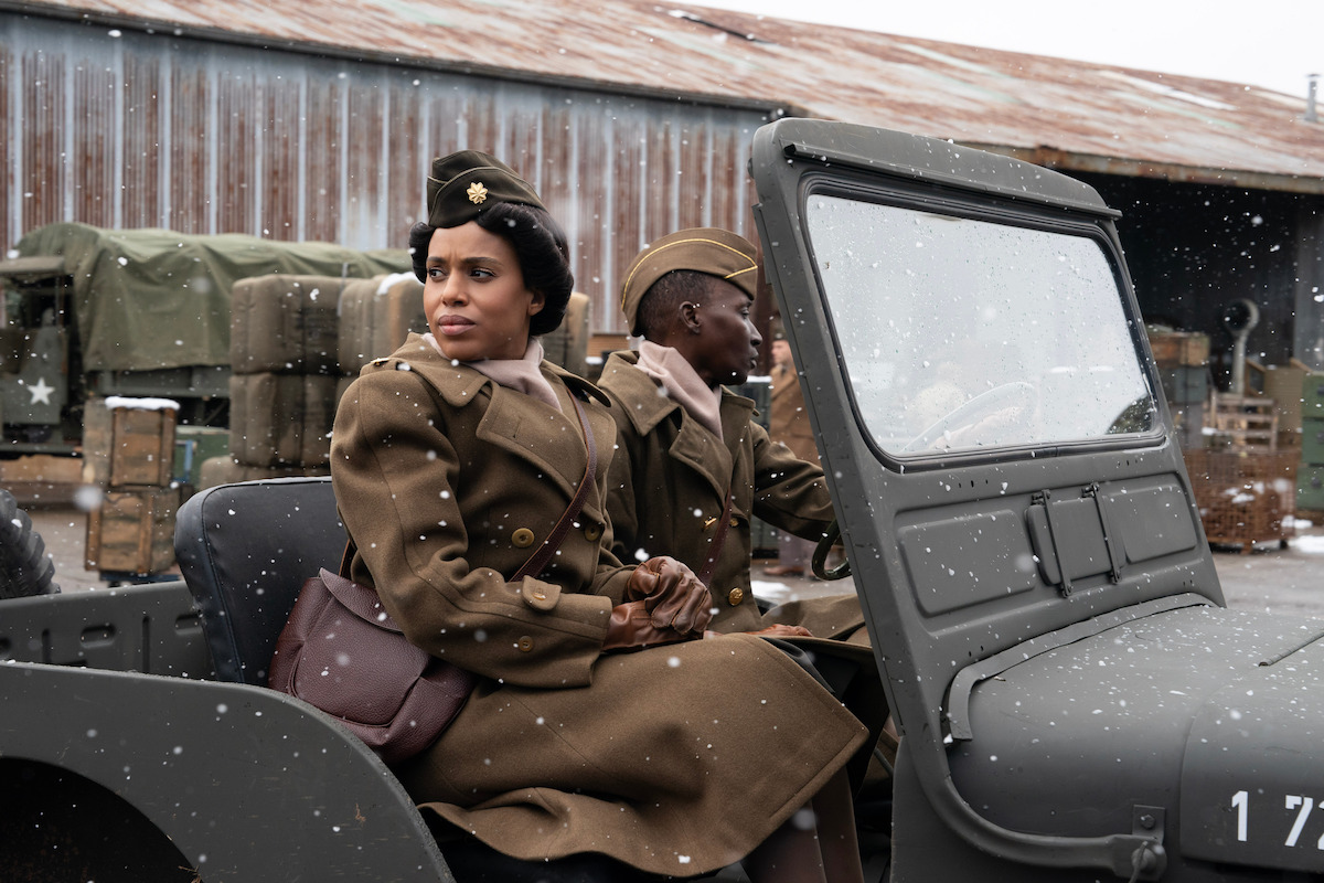 Major Charity Adams (Kerry Washington) dons her uniform in an army truck.