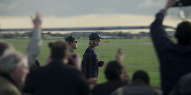 Navy sweatshirt and baseball cap