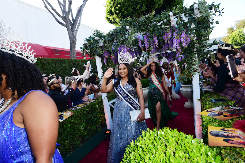 Miss Jackson State University 2022-23, Naomi Harris, waves on the Queen Charlotte red carpet