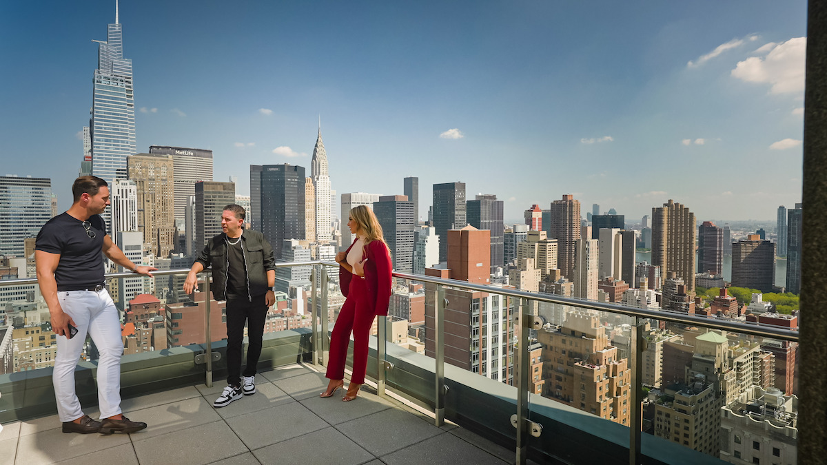 The ‘Selling the City’ cast on a rooftop overlooking New York.