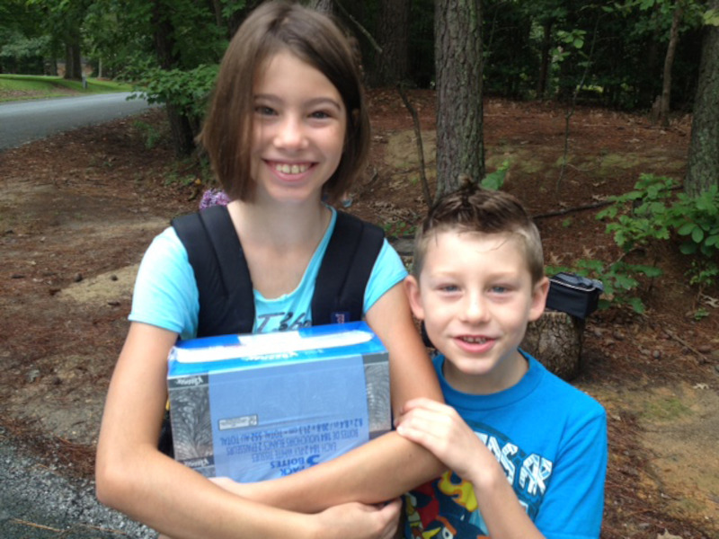 Amina and Belel on the first day of school, 2013. 