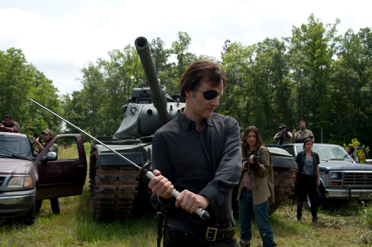 The Governor swings a sword