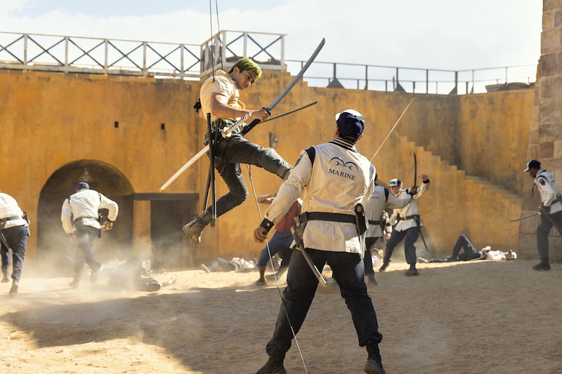 Mackenyu as Roronoa Zoro doing a stunt in the air on set of Season 1 of 'One Piece.'