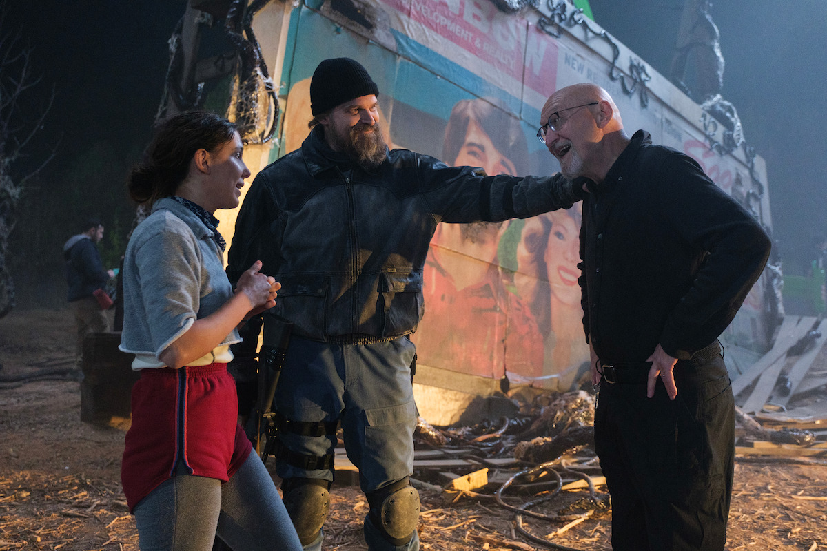 Millie Bobby Brown, David Harbour, and director Frank Darabont behind the scenes of ‘Stranger Things 5’