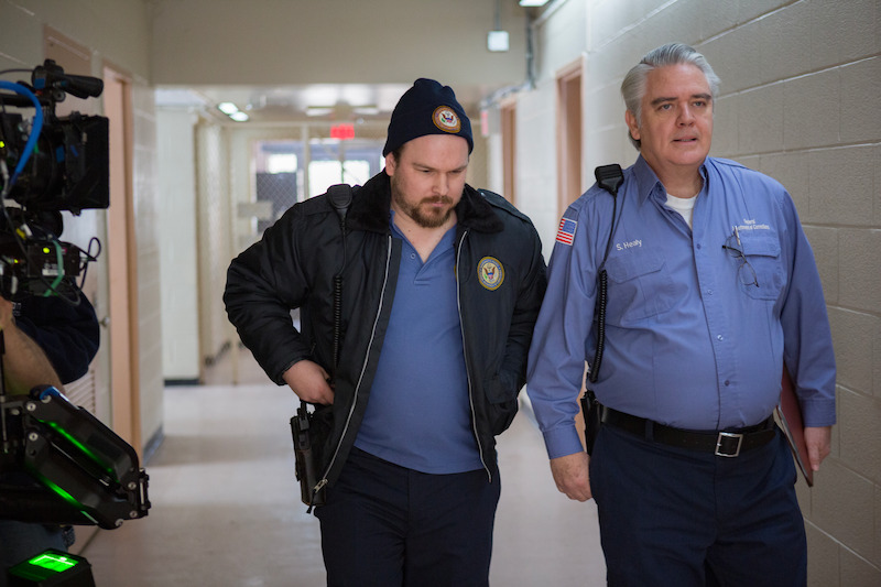 (L to R) Matt Peters as Joel, Michael Harney as Sam on the set of Orange Is The New Black Season 2.