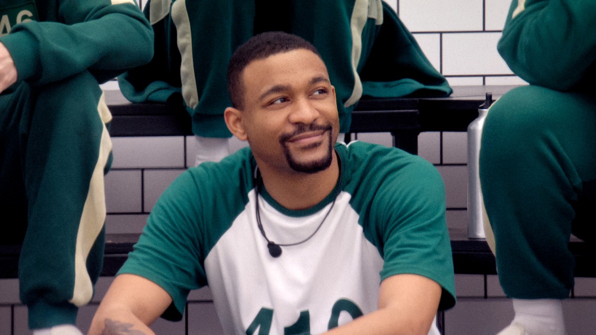 Player 410 sits in dormitory.