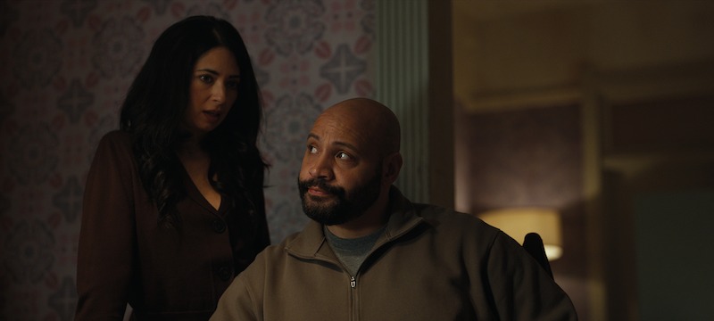 Aarti Mann as Violet Ebner and Colton Dunn as Lester Kitchens in Season 2 of ‘The Recruit’