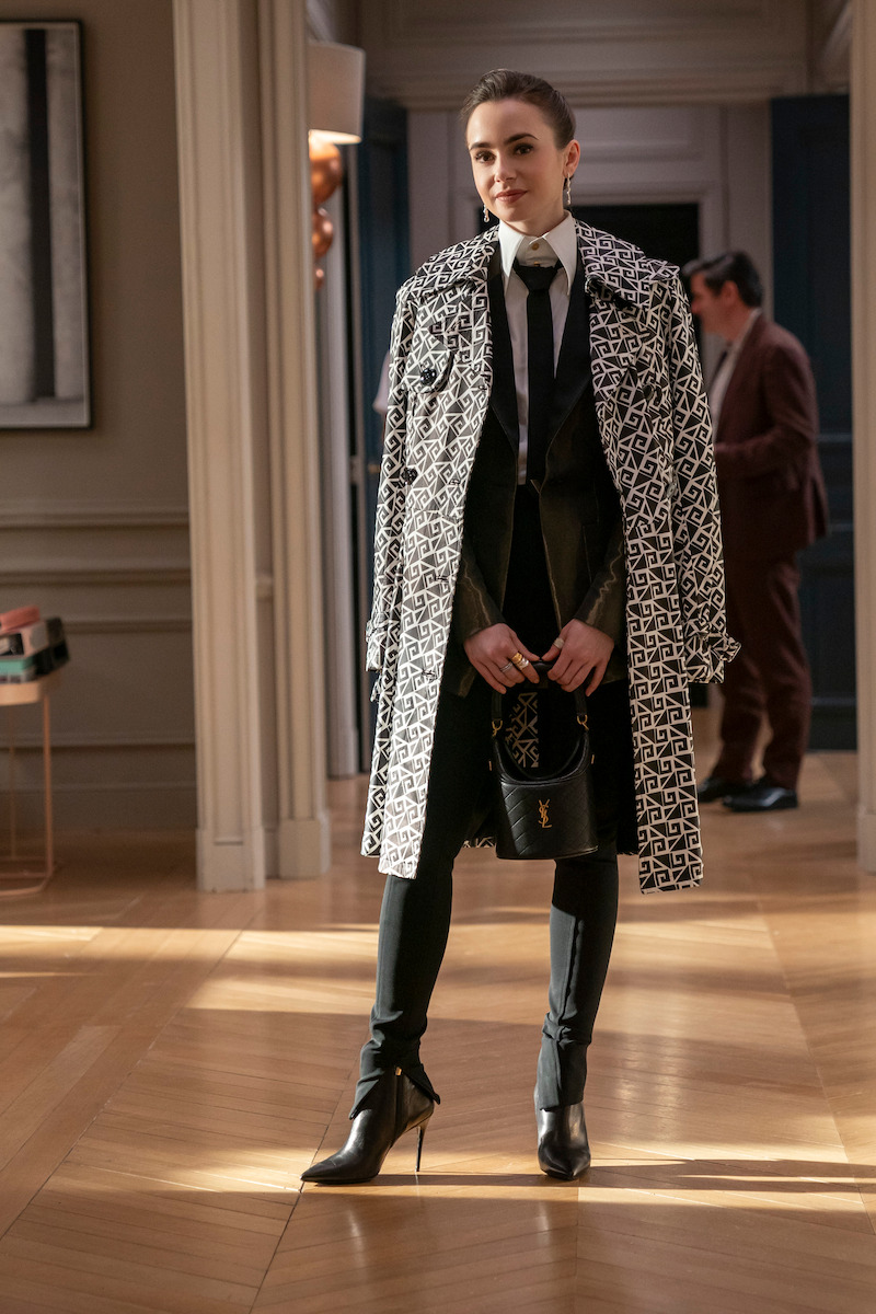 Lily Collins as Emily stands in the office in Season 4 of 'Emily in Paris'