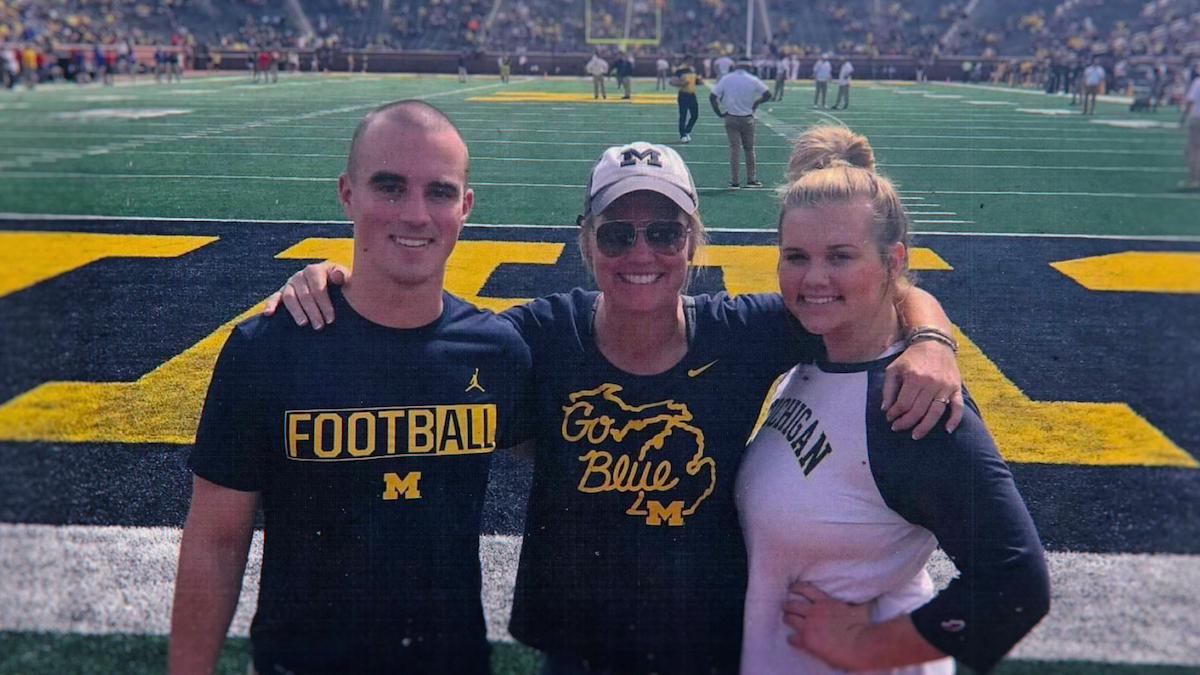 Connor Stallions on the field with his family.