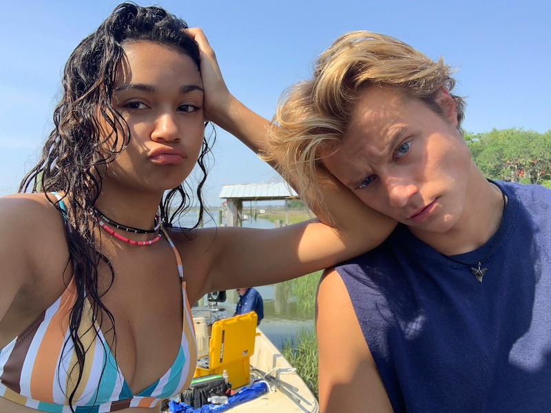 Madison Bailey and Rudy Pankow in Outer Banks Season 1 Behind-the-Scenes Photo Gallery.