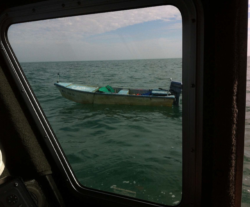 Photo taken from a U.S. Coast Guard vessel pulled up to Pat's Stumpnocker at sea 