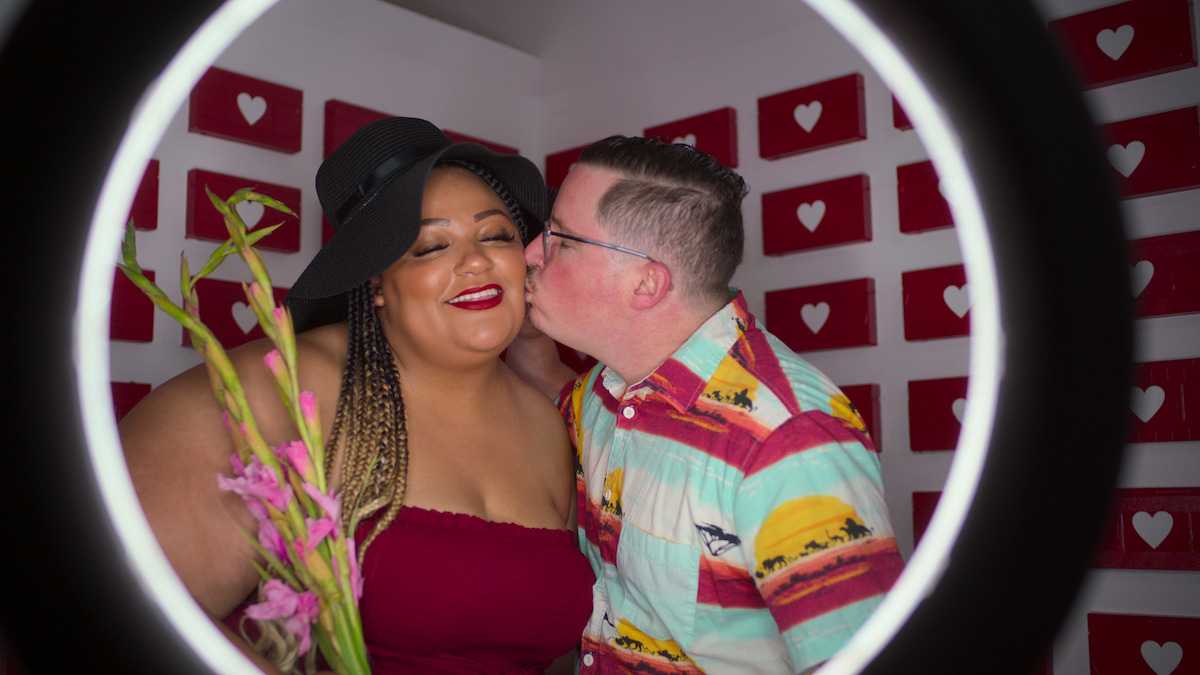 Nakysha cozies up to her date.