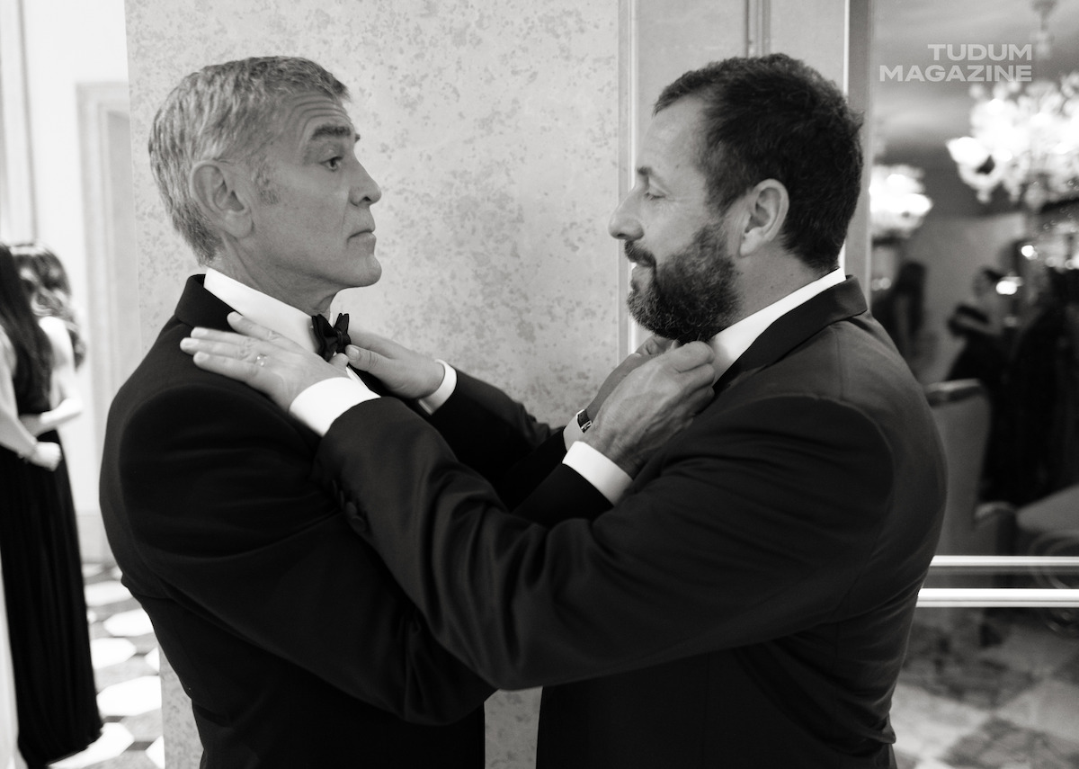 George Clooney and Adam Sandler adjust one another’s bow ties ahead of hitting the red carpet for the world premiere of Jay Kelly at the 2025 Venice Film Festival.