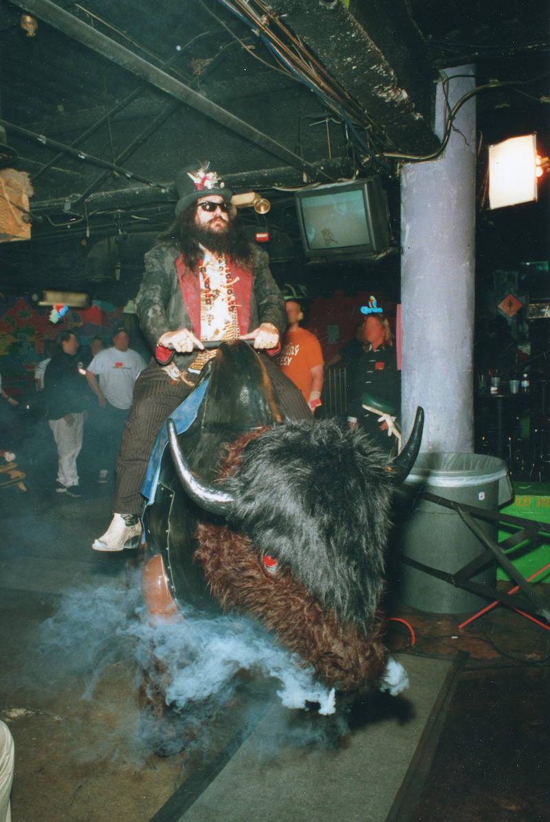 Buffalo Jim riding a steaming buffalo at a Las Vegas wrestling club.  - ‘Unsolved Mysteries’ Volume 3 Bonus Material - Photos of Buffalo Jim 