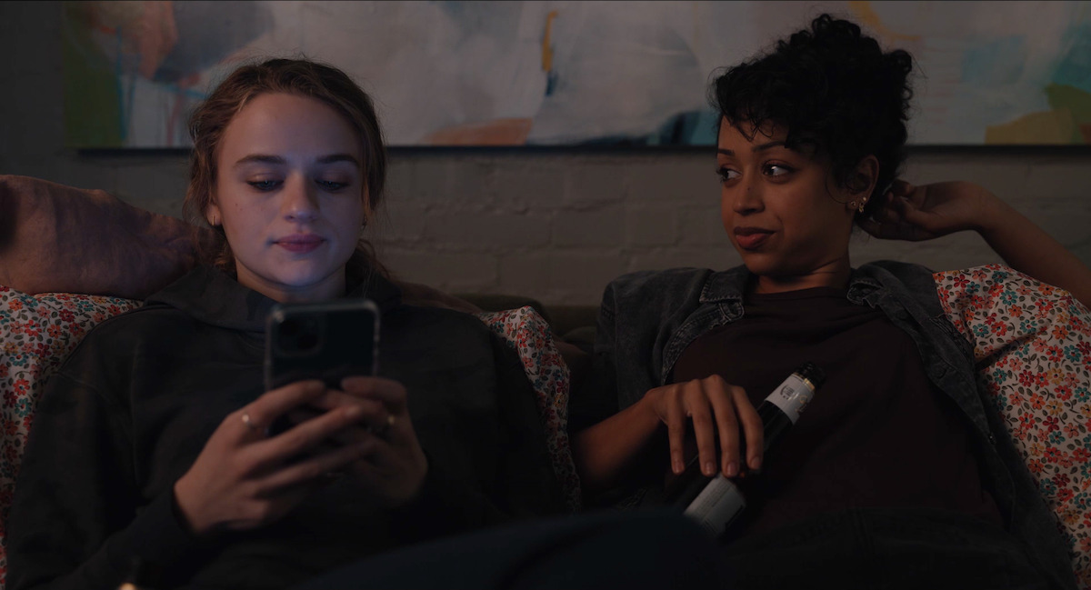 Joey King as Zara Ford and Liza Koshy as Eugenie hang out together in ‘A Family Affair.’