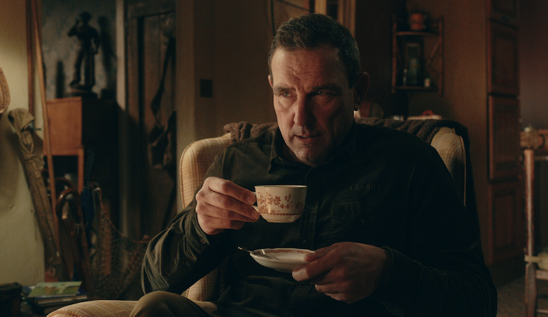 Vinnie Jones holds a teacup in Season 1 of ‘The Gentlemen.’