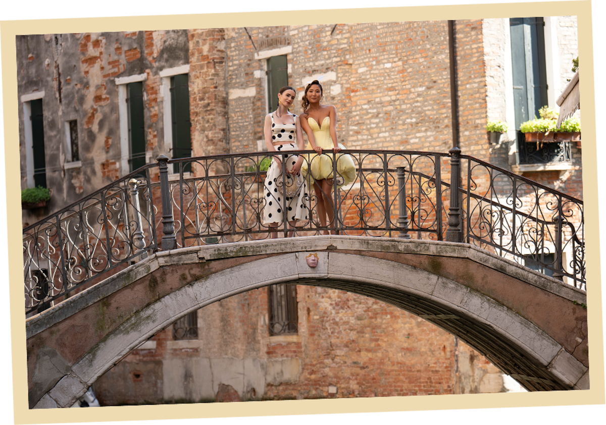 Lily Collins as Emily and Ashley Park as Mindy in ‘Emily in Paris’ Season 5.