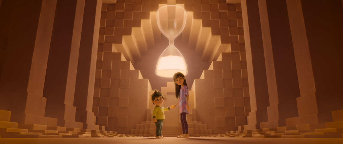 Elliot and Stevie in front of a golden hourglass.