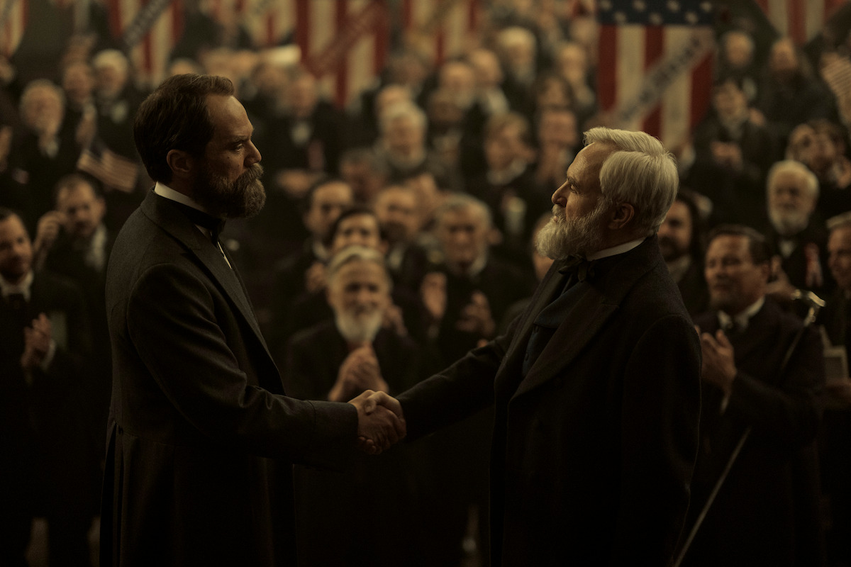 Michael Shannon as James Garfield shakes hands with Bradley Whitford as James Blaine in ‘Death by Lightning.’