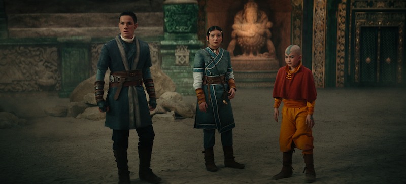 Ian Ousley as Sokka, Kiawentiio as Katara, Gordon Cormier as Aang stand together in season 1 of 'Avatar: The Last Airbender'