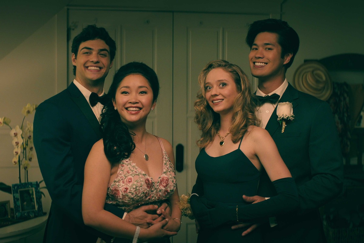 Noah Centineo as Peter, Lana Condor as Lara Jean, Madeleine Arthur as Chris Donati, and Ross Butler as Trevor pose for prom pictures in ‘To All the Boys: Always and Forever.’