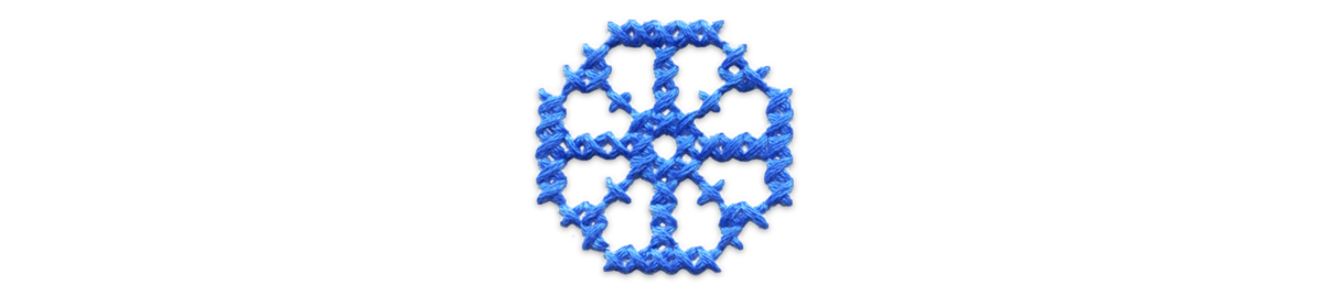 Blue cross stitched wagon wheel.
