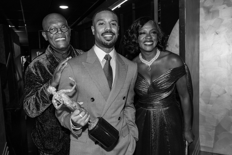 Samuel L. Jackson, Michael B. Jordan, and Viola Davis smile for the camera as Michael B. Jordan holds his Actor Award.