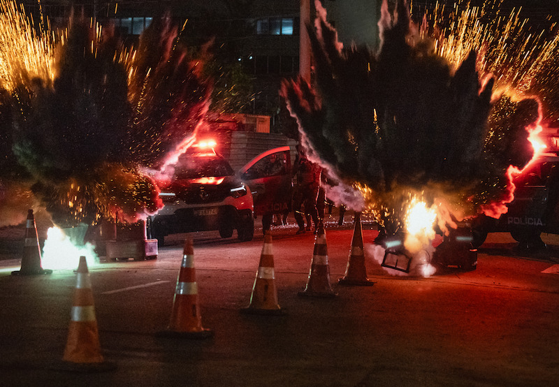 A night scene with explosions.