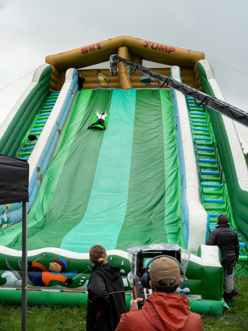 In a fun sequence, Hal (John Cameron Mitchell) gets to slide down a green-screened ski jump as he’s sucked into the dream vortex.