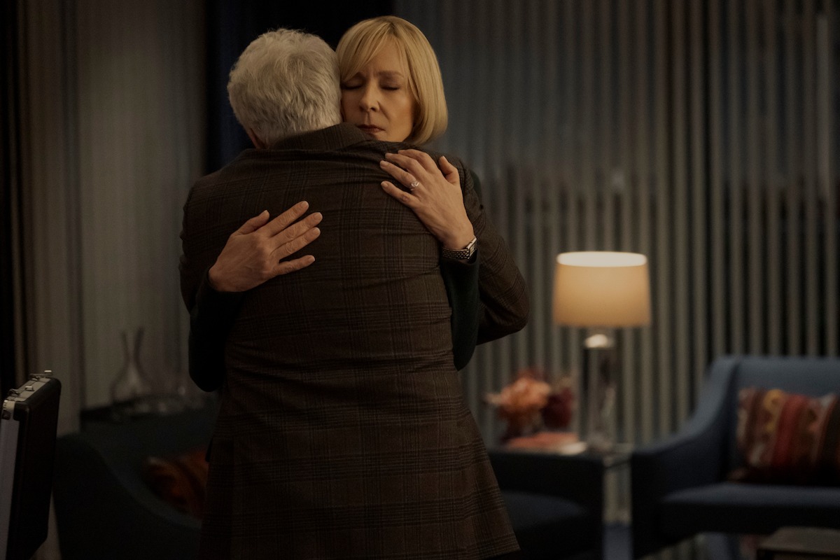 Allison Janney as Grace Penn embraces Bradley Whitford as Todd Penn.