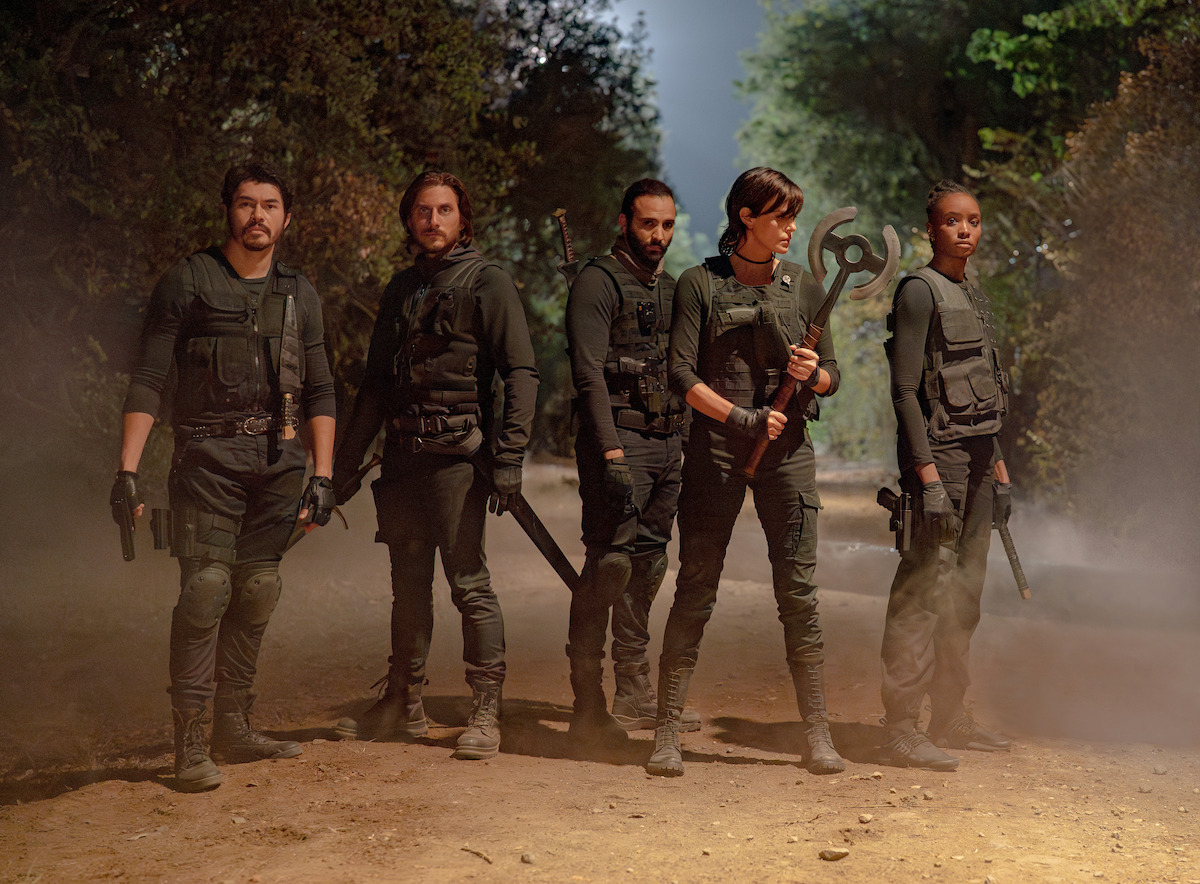 Henry Golding as Tuah, Luca Marinelli as Nicky, Marwan Kenzari as Joe, Charlize Theron as Andy, and KiKi Layne as Nile in 'The Old Guard 2'