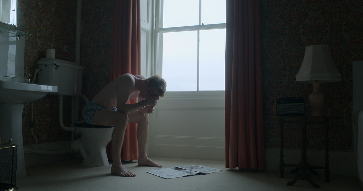 Prince Harry sitting in despair