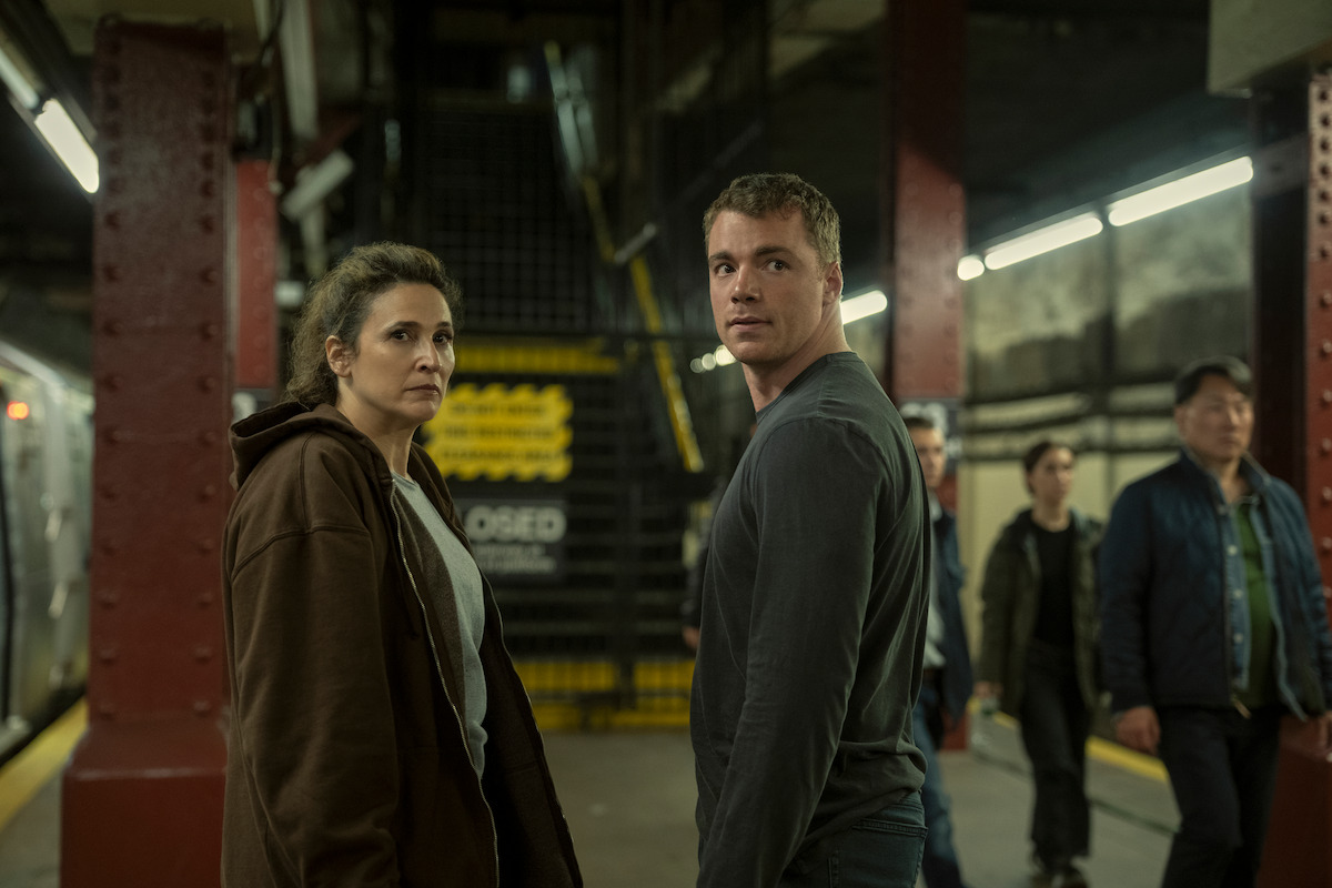 Michaela Watkins as Freya and Gabriel Basso as Peter Sutherland in ‘The Night Agent’ Season 3