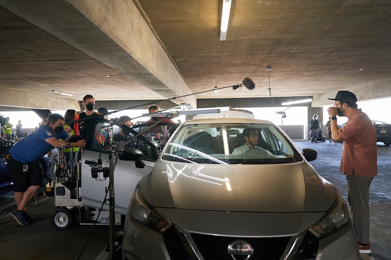 Justin Chien as Charles Sun, Director/Executive Producer Kevin Tancharoen in episode 102 of The Brothers Sun. 