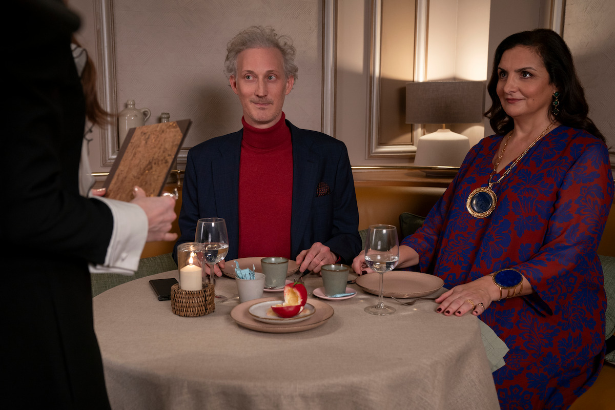 Bruno Gouery as Luc and Laurence Gormezano as Marianne in Season 4 of ‘Emily in Paris’