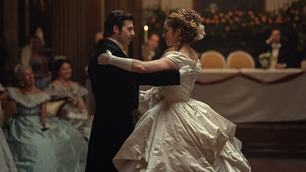 Anthony Boyle as Arthur Guinness and Danielle Galligan as Lady Olivia Hedges dance together in ‘House of Guinness’ Season 1.